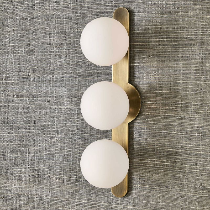 Brass wall lamp with three circular opal globes