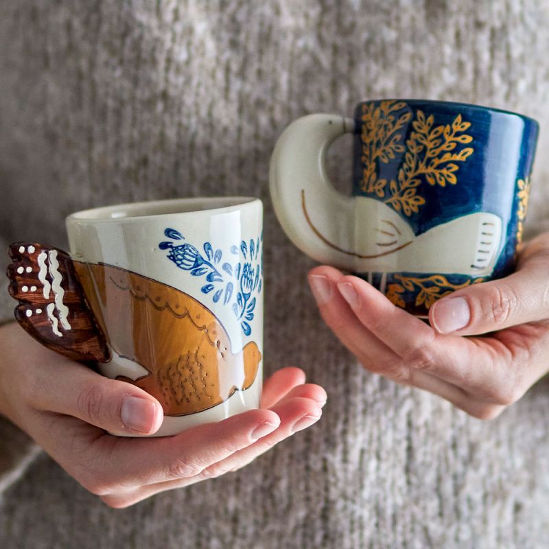 Mug with bird detail design