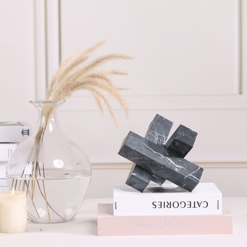 Elegant black marble sculpture in geometric design