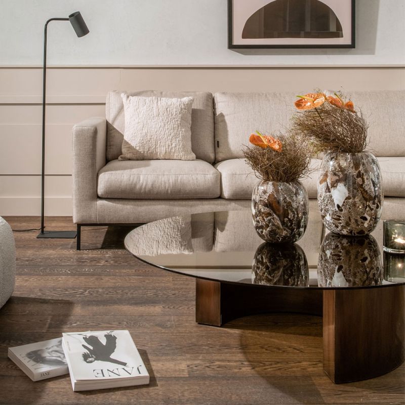 Brown and white speckled textured glass vase