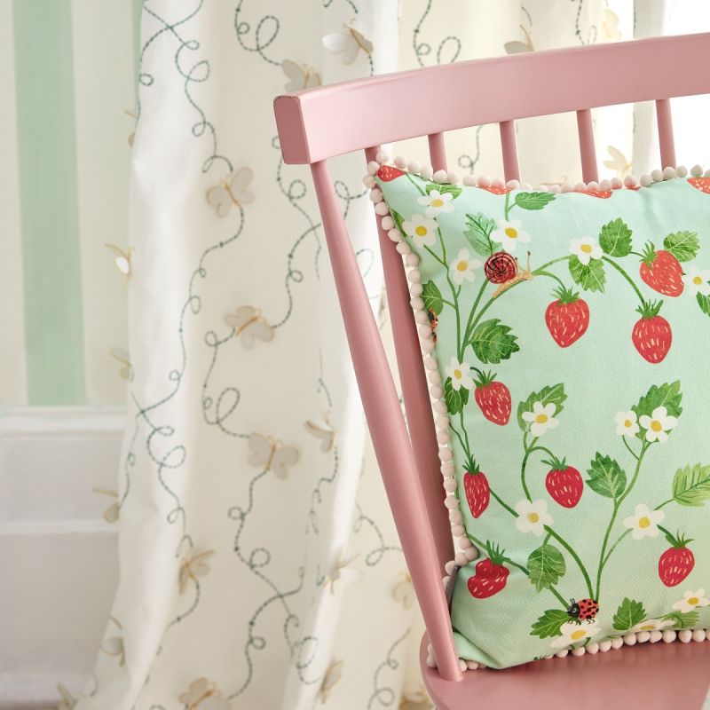 Add a burst of color to your space with the Villa Nova Strawberry Patch Cushion, featuring vibrant strawberry patterns for a touch of whimsy.
