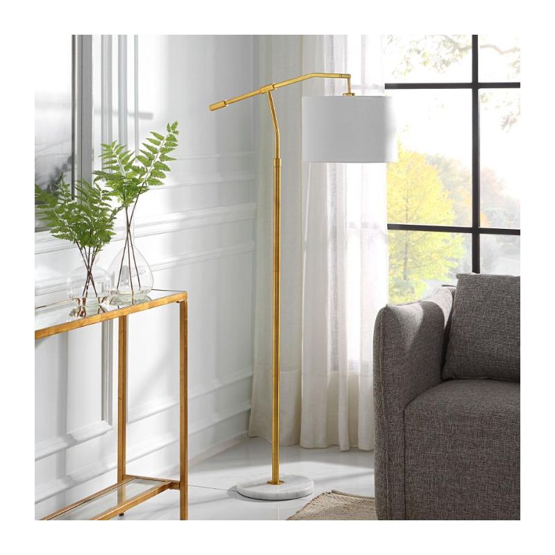 Sleek floor lamp with marble base and gold fixture
