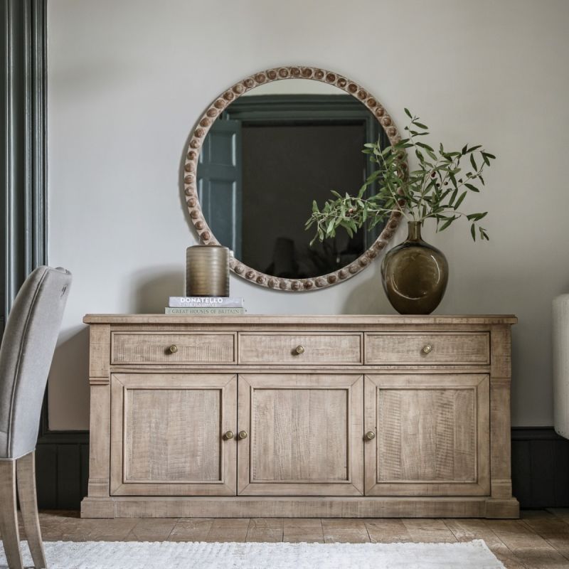 Charming round mirror with rustic elegance