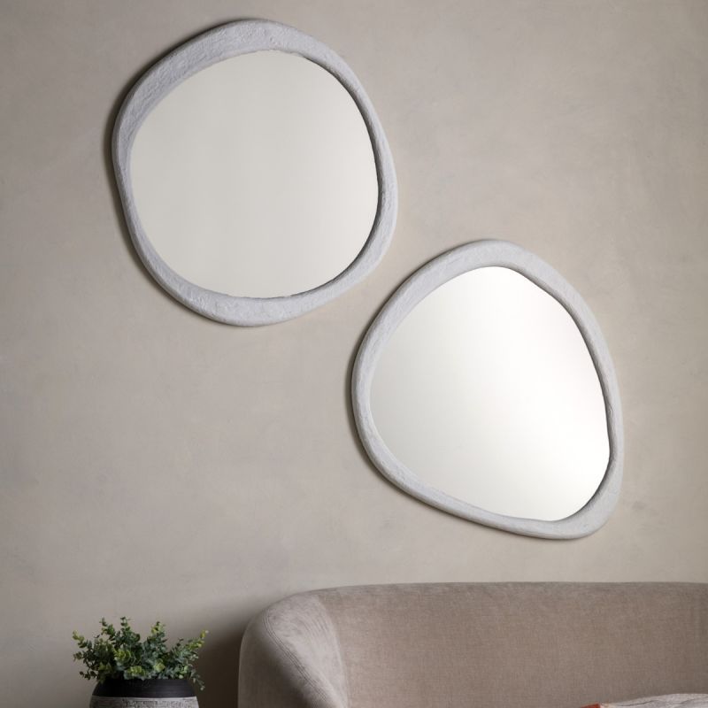 Wall mirror with a wavy concrete-effect frame