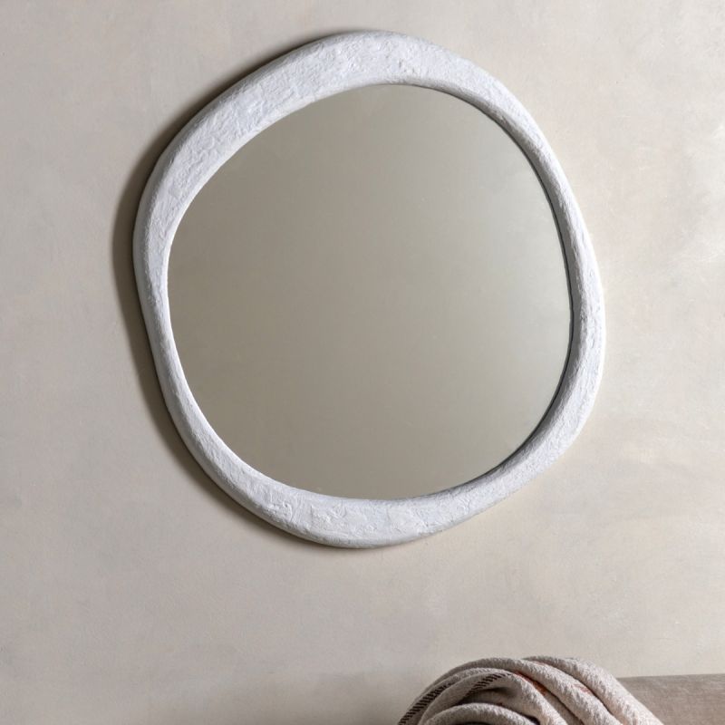 Wall mirror with a wavy concrete-effect frame
