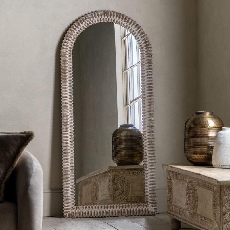 Whitewashed leaner mirror with intricate etching