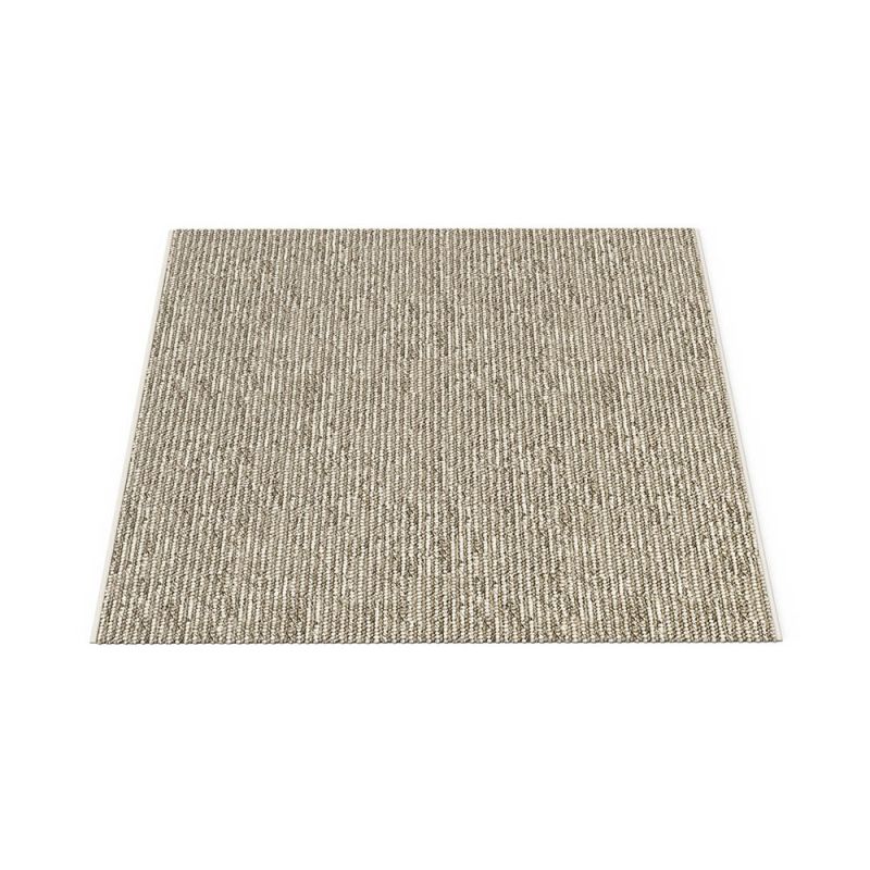textured woven rug in natural colour finish