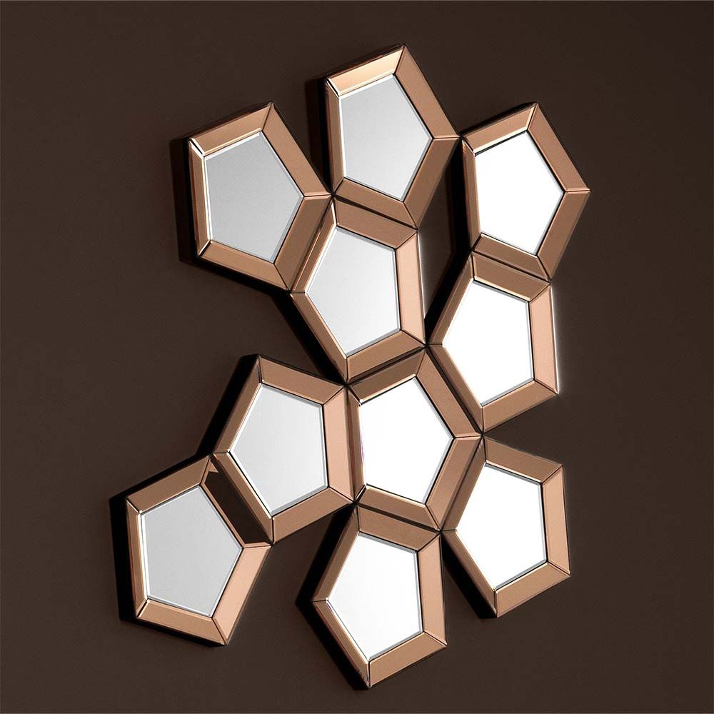 A stunning multi-part mirror in a rose gold finish