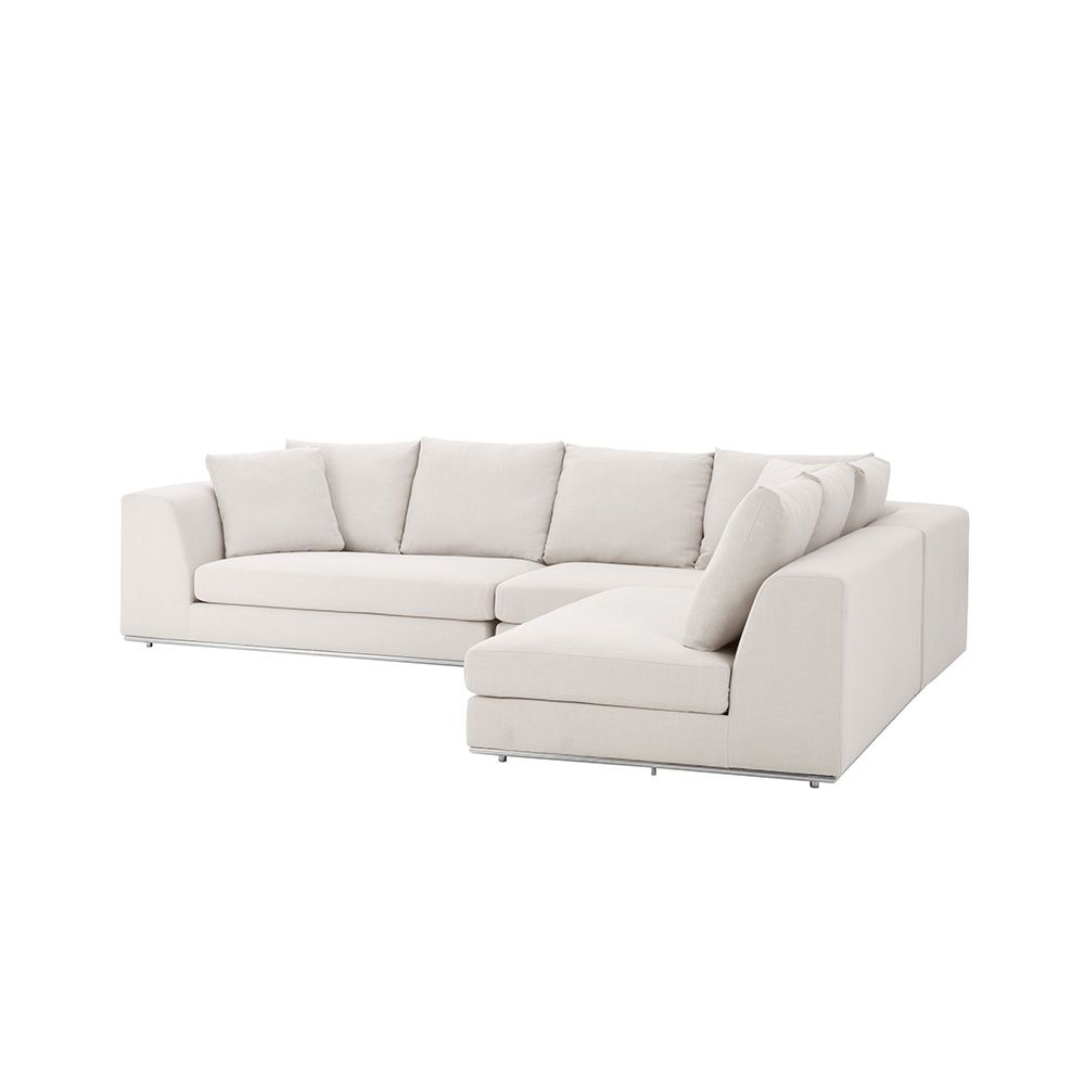 Luxurious corner sofa with plush back and scatter cushions, all upholstered in Panama Natural upholstery.