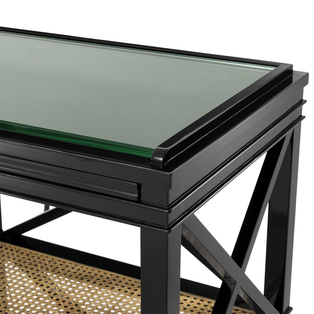 A stunning black mahogany and rattan console table with  a glass surface