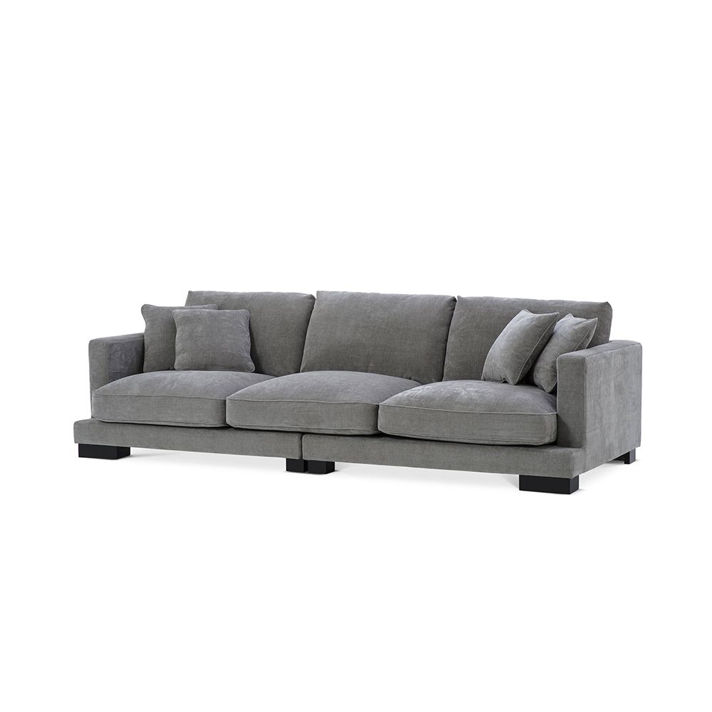 Luxurious large Eichholtz sofa with black feet, available in white, grey and sand