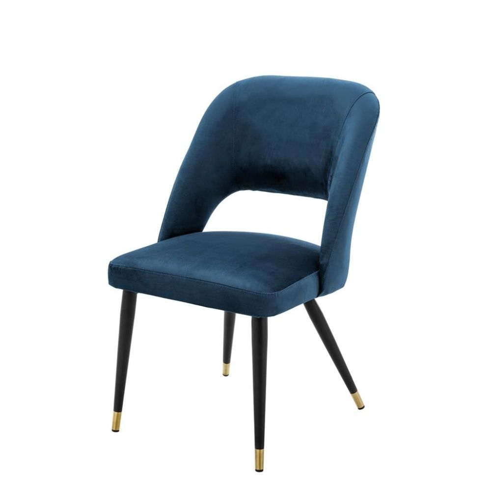 Contemporary blue velvet dining chair with brass capped tapered legs