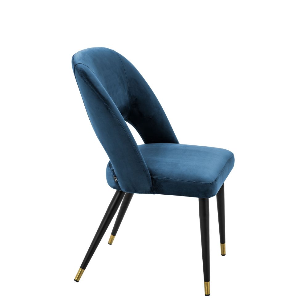 Contemporary blue velvet dining chair with brass capped tapered legs