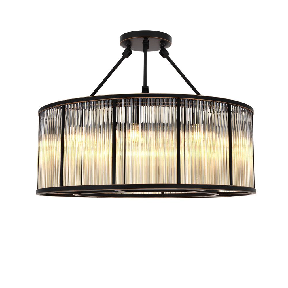 A luxurious bronze chandelier with clear, ribbed glass