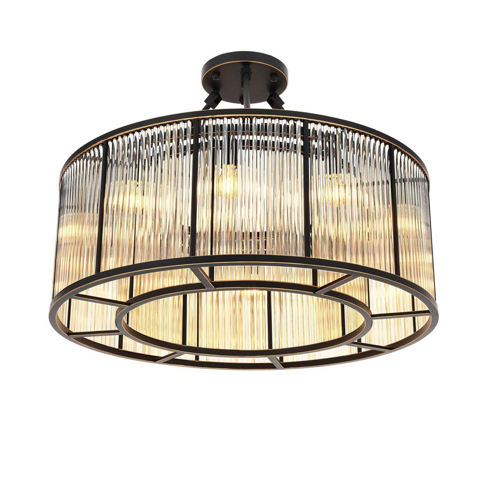 A luxurious bronze chandelier with clear, ribbed glass