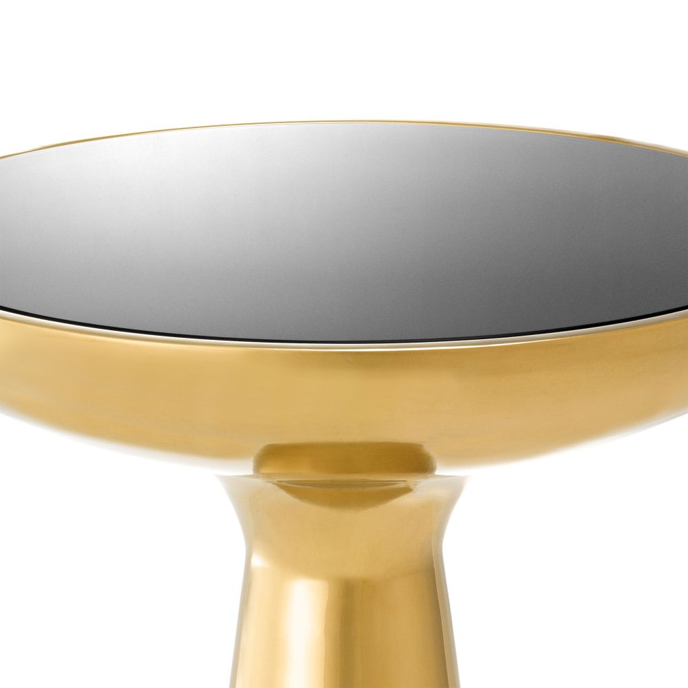 Sleek low gold side table with black glass table top