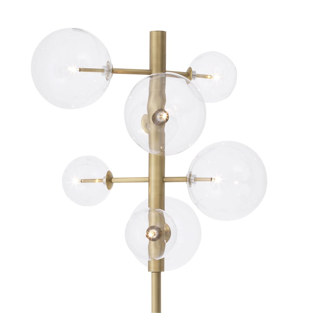 Retro chic antique brass floor lamp with glass globe design by Eichholtz