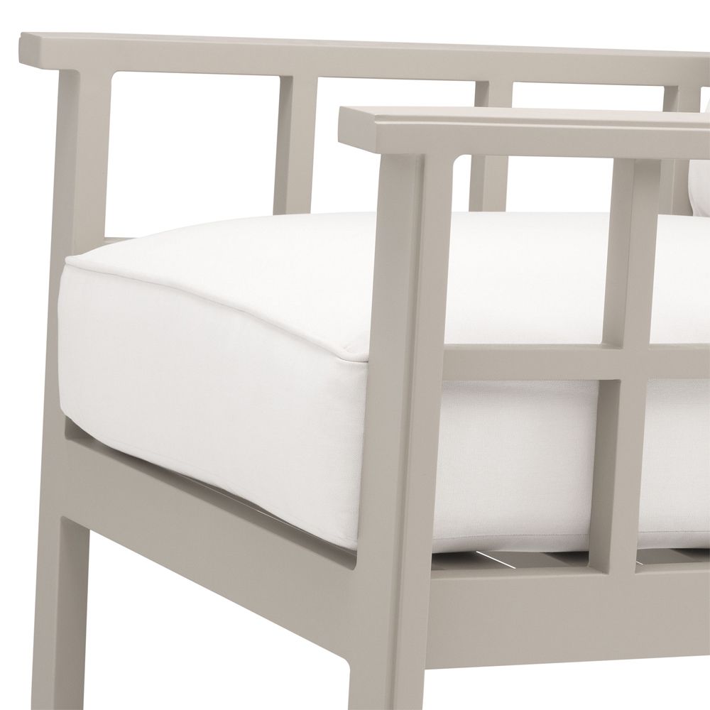 Contemporary greige outdoor armchair with neutral-toned seat cushion by Eichholtz
