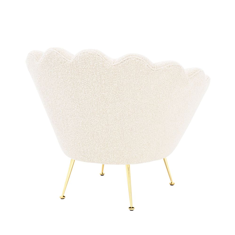 art deco-inspired boucle trapezium armchair with brass legs