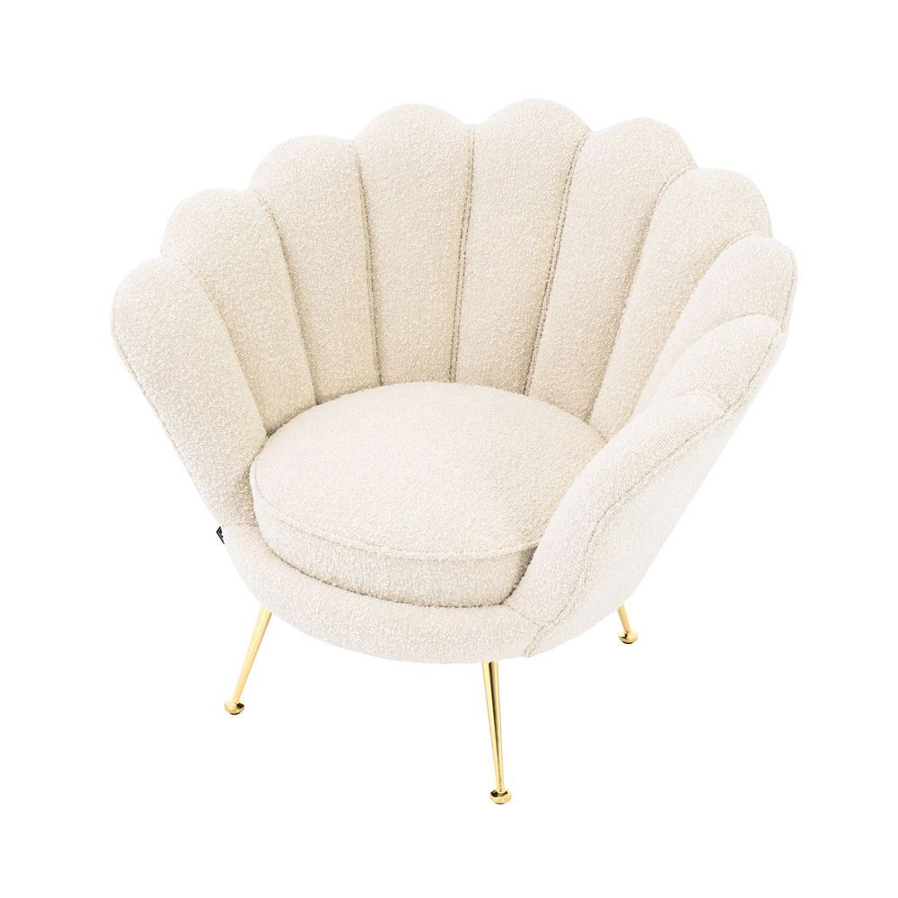 art deco-inspired boucle trapezium armchair with brass legs