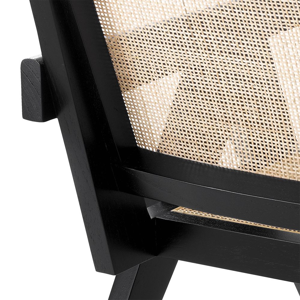 Rattan webbed, seated chair with black V-shaped legs