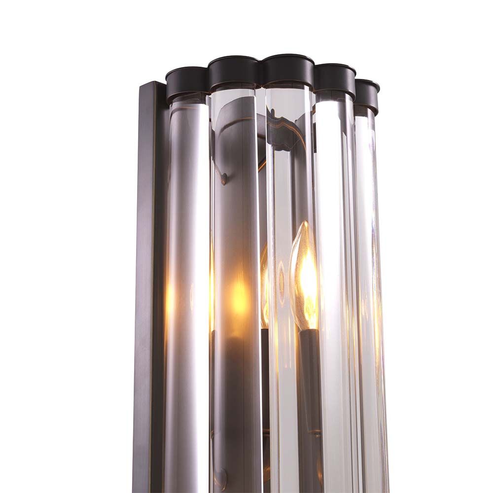 An Art Deco inspired wall lamp with a three bulb feature