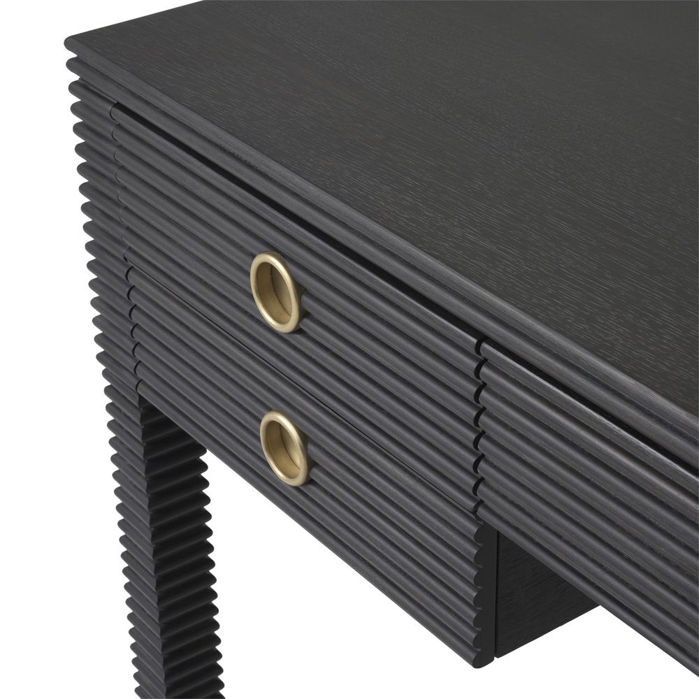 A luxurious charcoal grey luxury desk with a ribbed design and bronze accents 