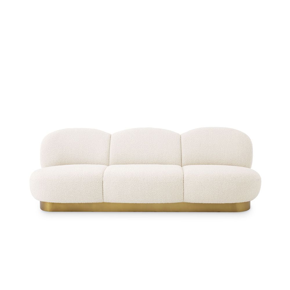 A fabulous three-seater boucle cream-upholstered sofa