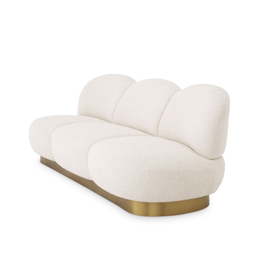 A fabulous three-seater boucle cream-upholstered sofa