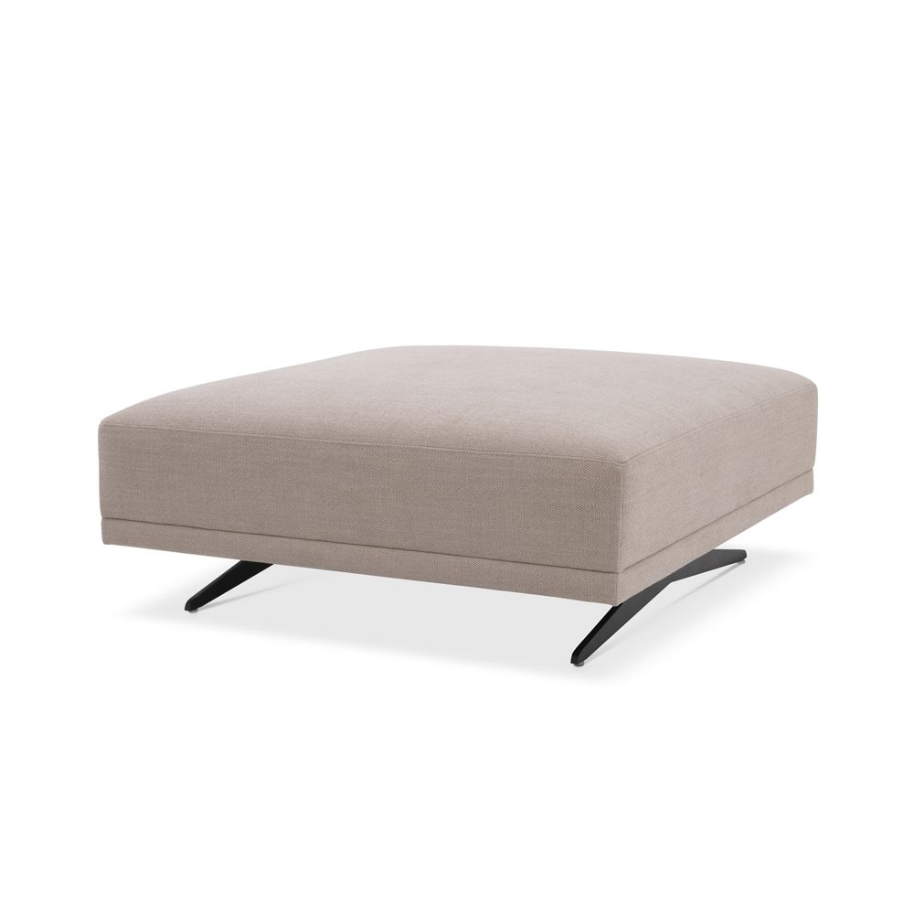 A luxurious avalon sand ottoman with black legs by Eichholtz