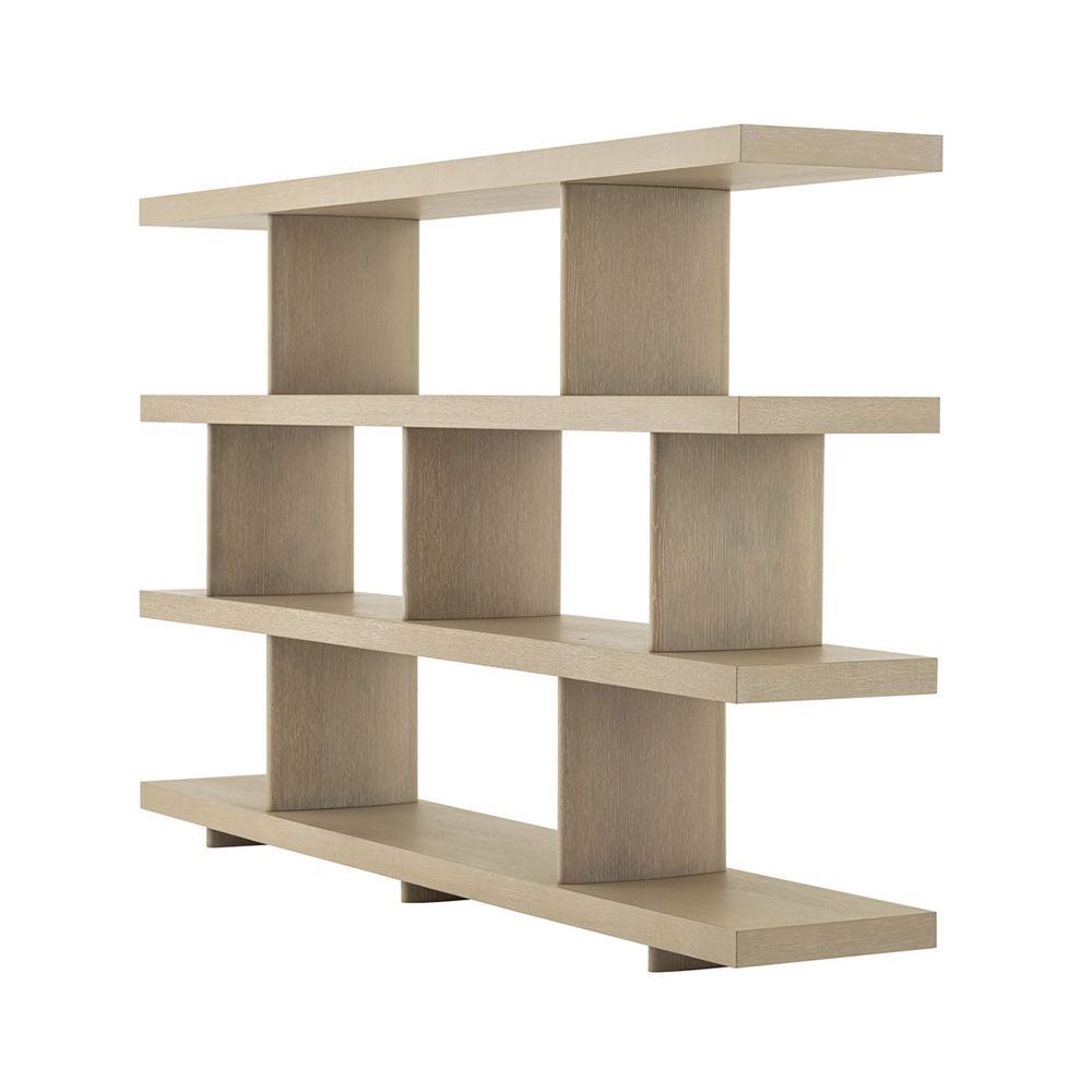 A contemporary cabinet from Eichholtz with a washed wood finish 
