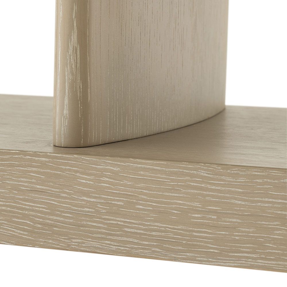A contemporary cabinet from Eichholtz with a washed wood finish 