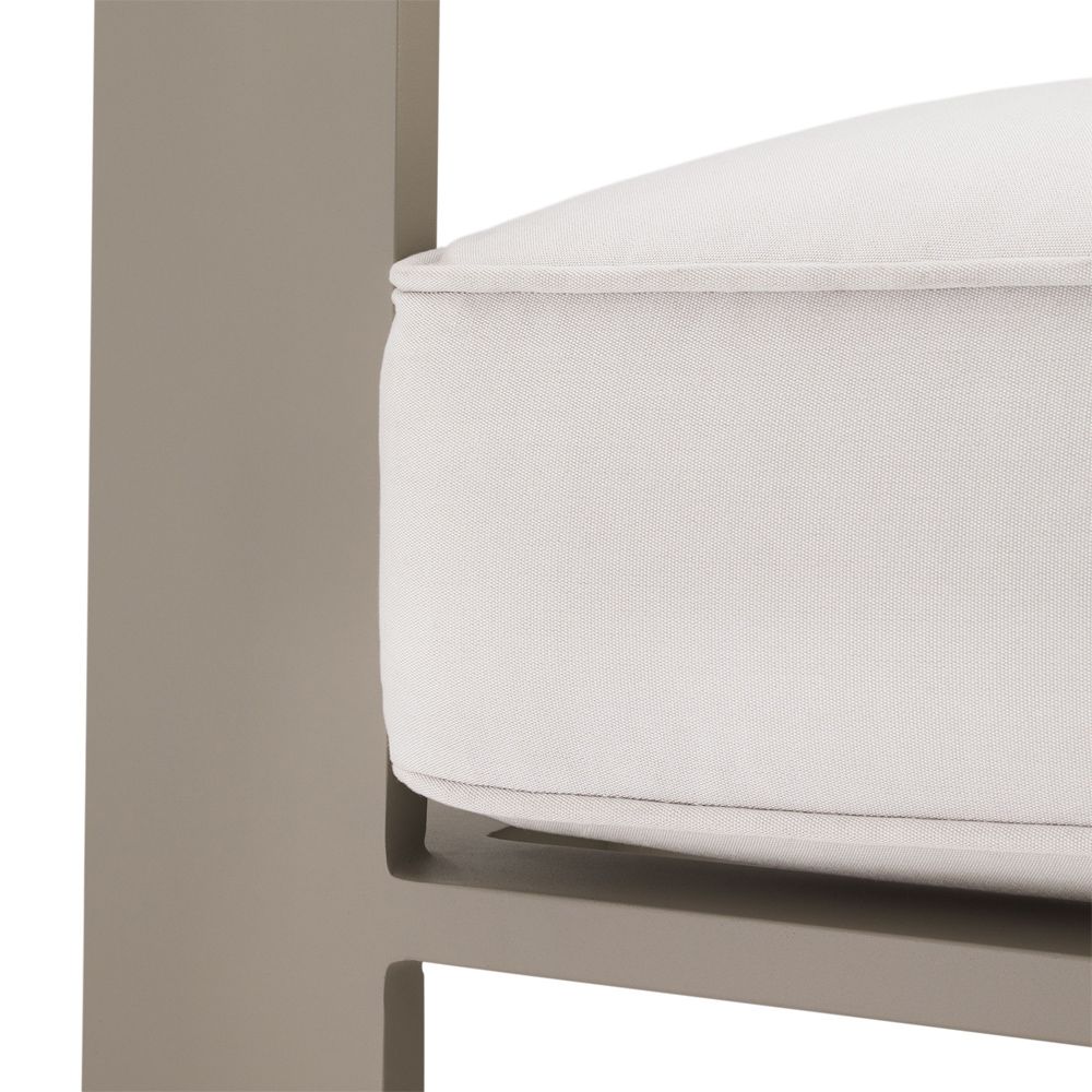 A stunning natural and sand-coloured outdoor lounge chair 
