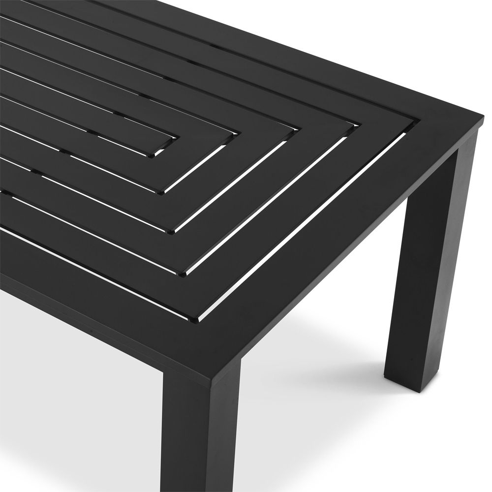A luxurious black-finished aluminium dining table