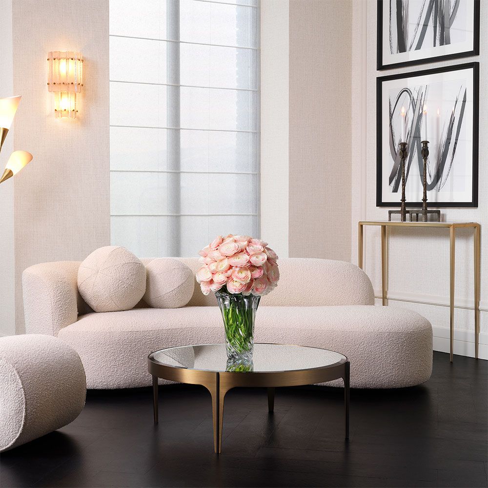 A fabulous asymmetrical boucle sofa