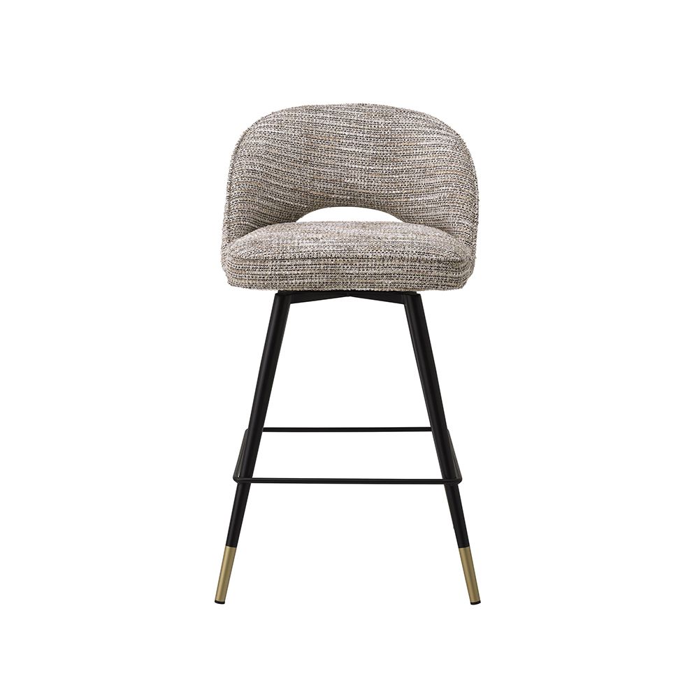 A luxury set of counter stools by Eichholtz with a Mademoiselle Beige upholstery and brass capped feet