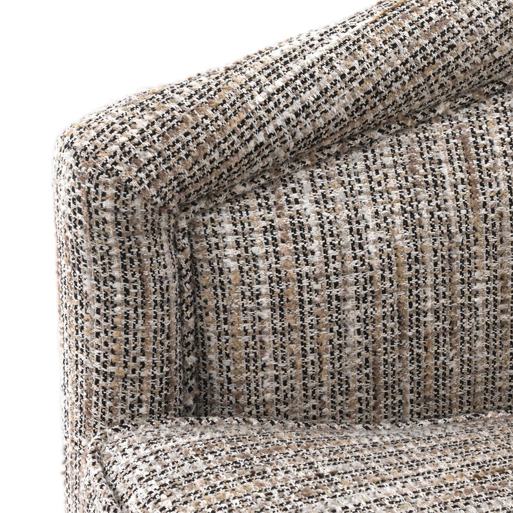 A woven beige armchair with a matte gold swivel base