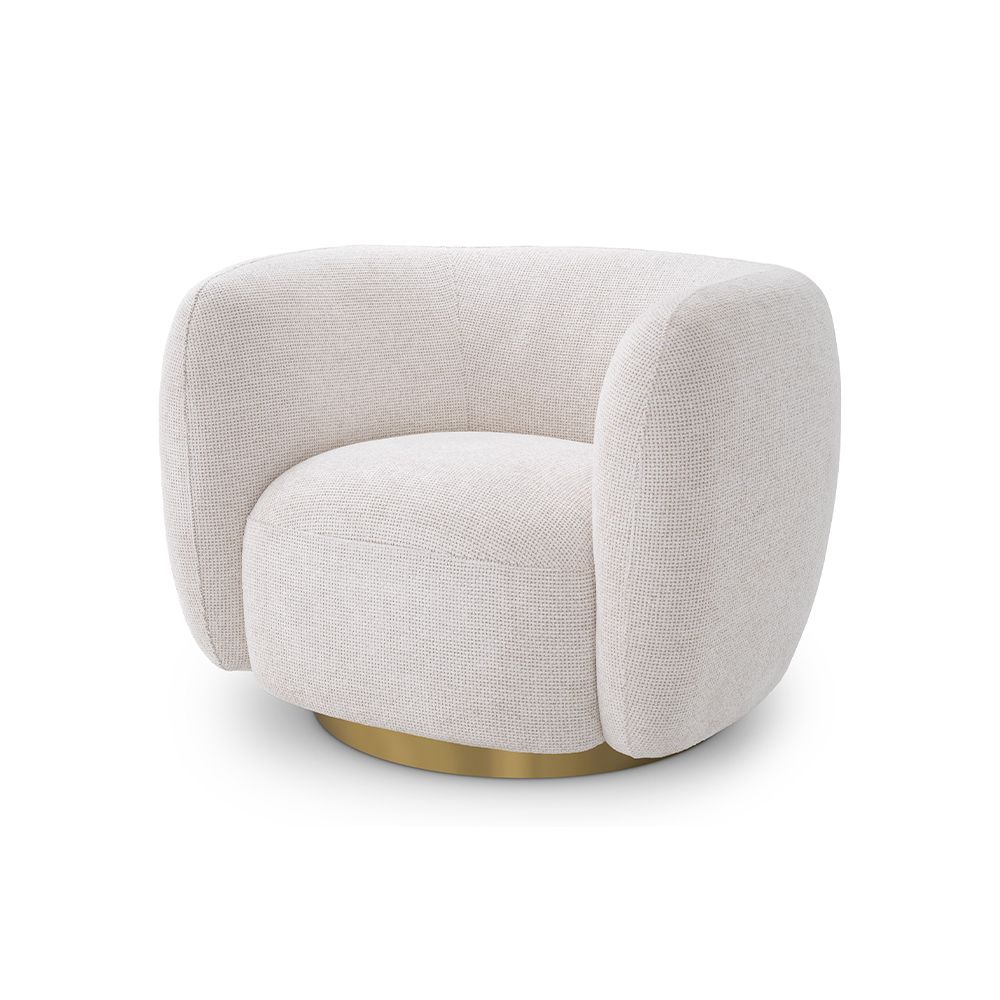 A curvaceous swivel by Eichholtz with a Lyssa Off-White fabric upholstery and a glamorous brushed brass swivel base