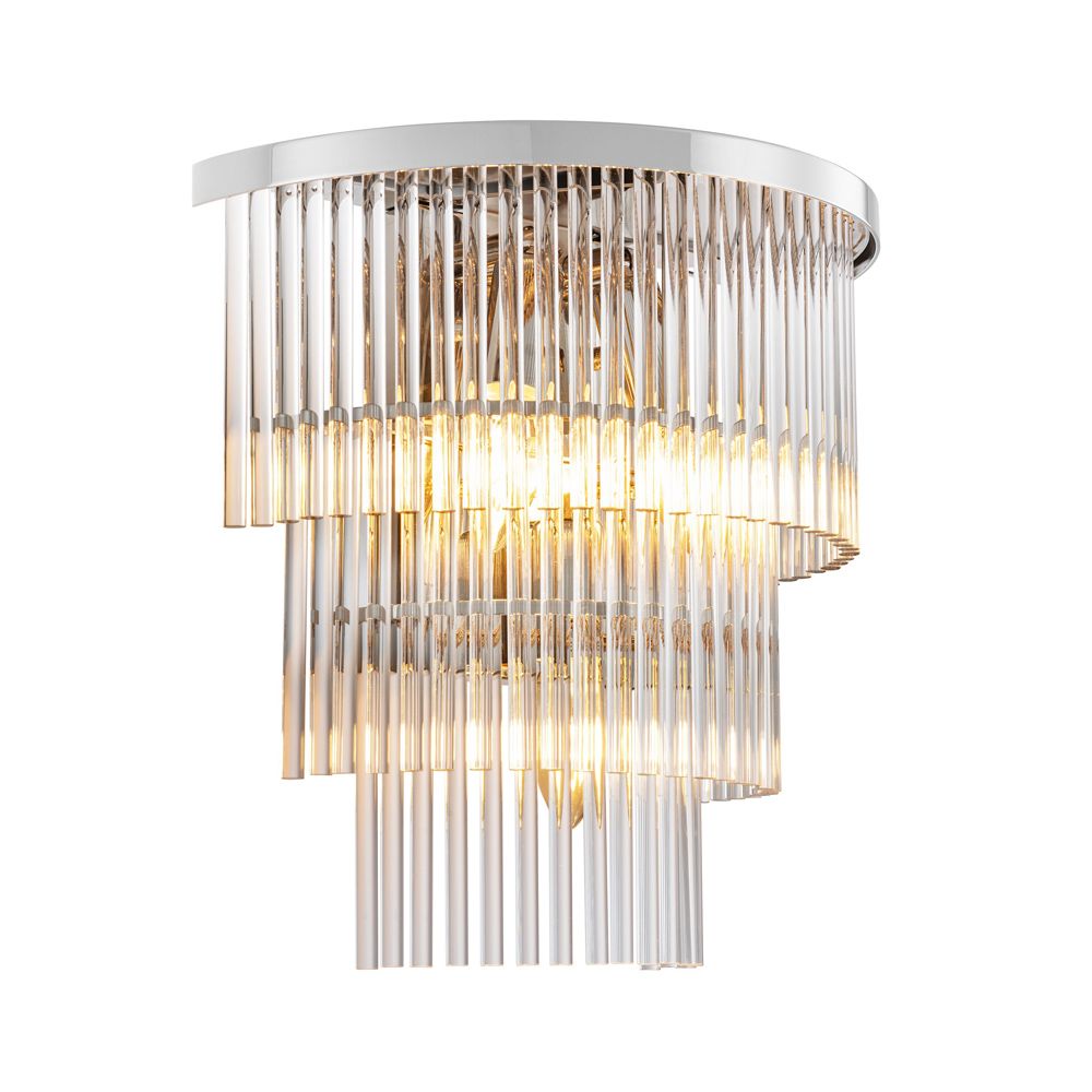 An elegant clear glass and polished nickel wall lamp