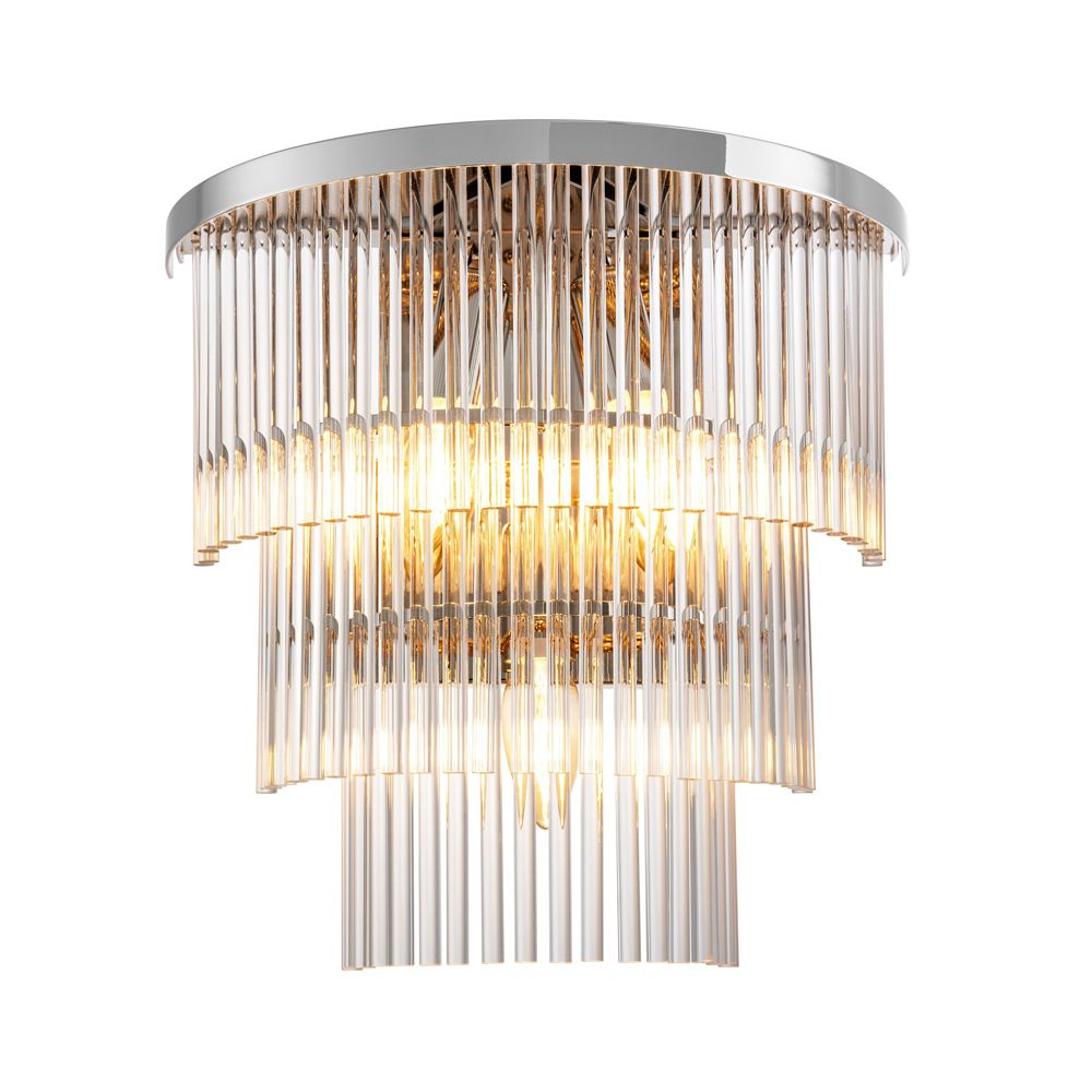 An elegant clear glass and polished nickel wall lamp