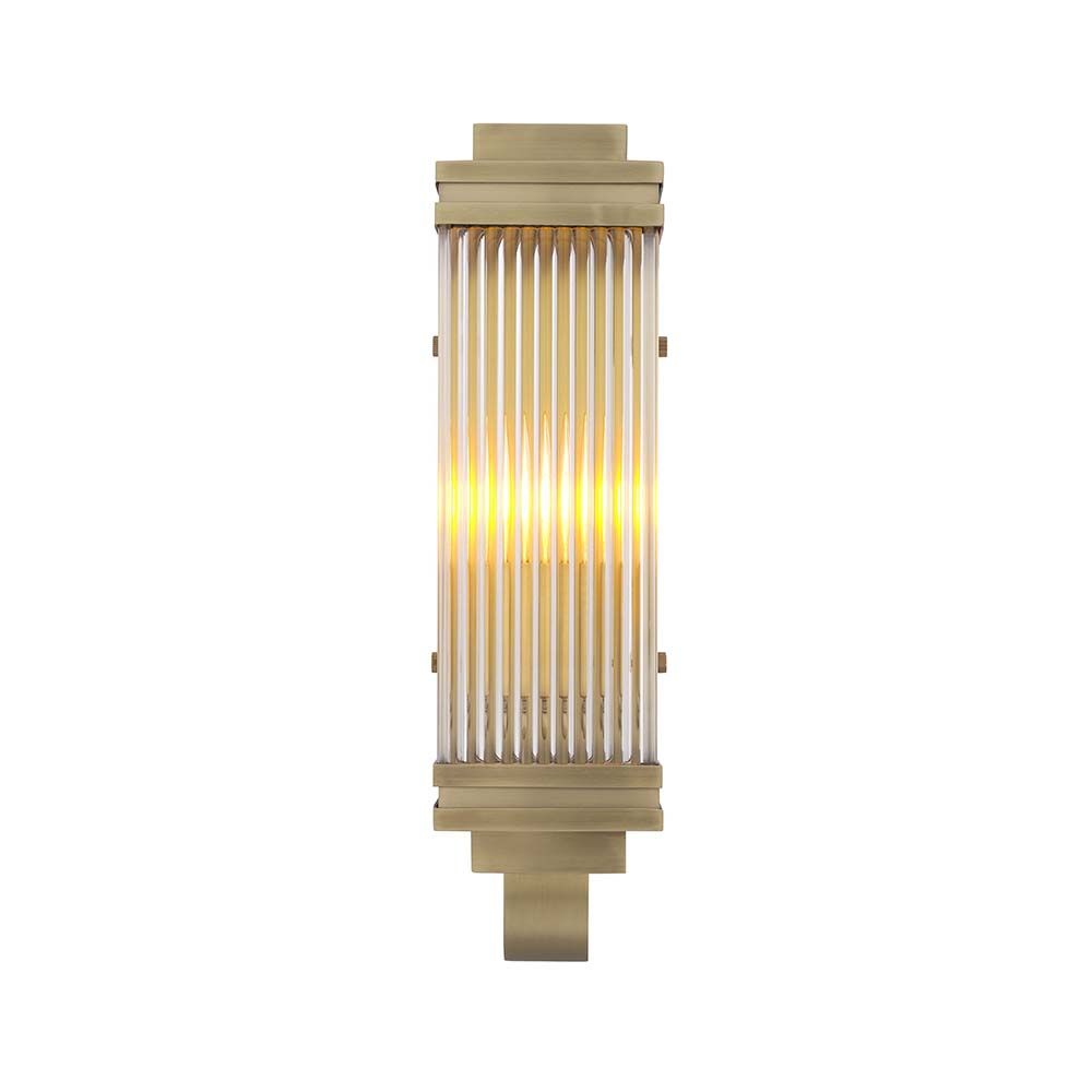 A vintage and art deco inspired wall lamp in a brass finish adorned with glass rods.