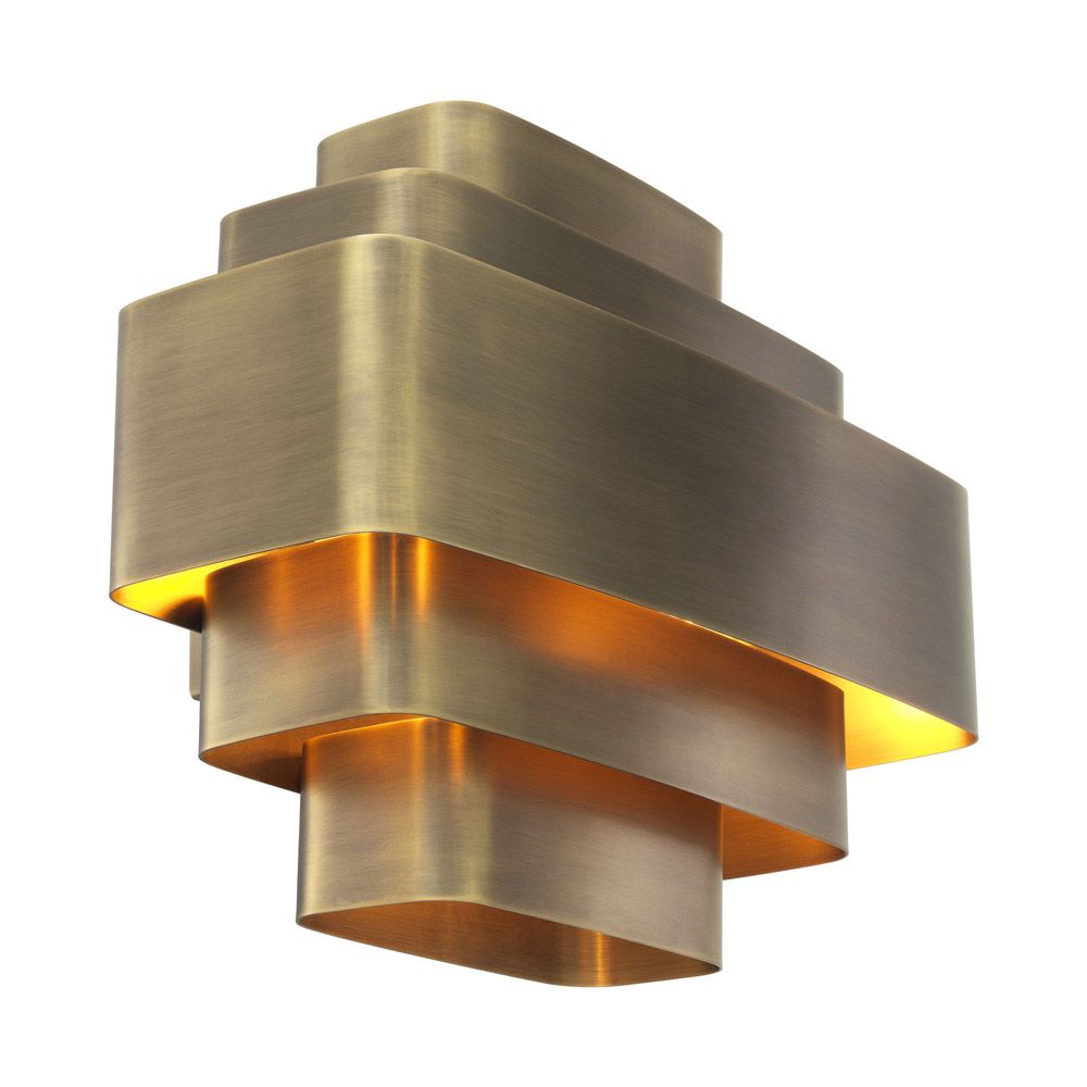 A statement, Art-Deco wall lamp with a vintage brass finish 