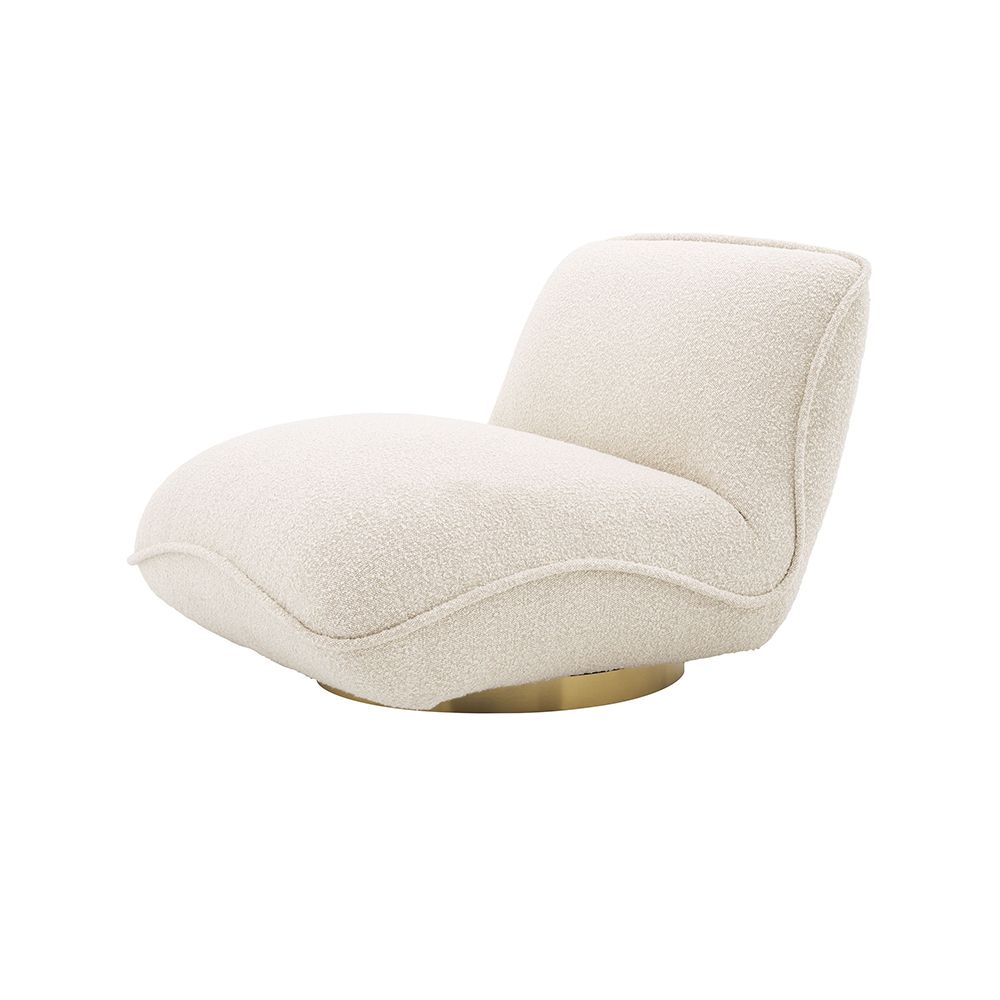 A beautiful, boucle cream upholstered chair by Eichholtz with a brushed brass base 