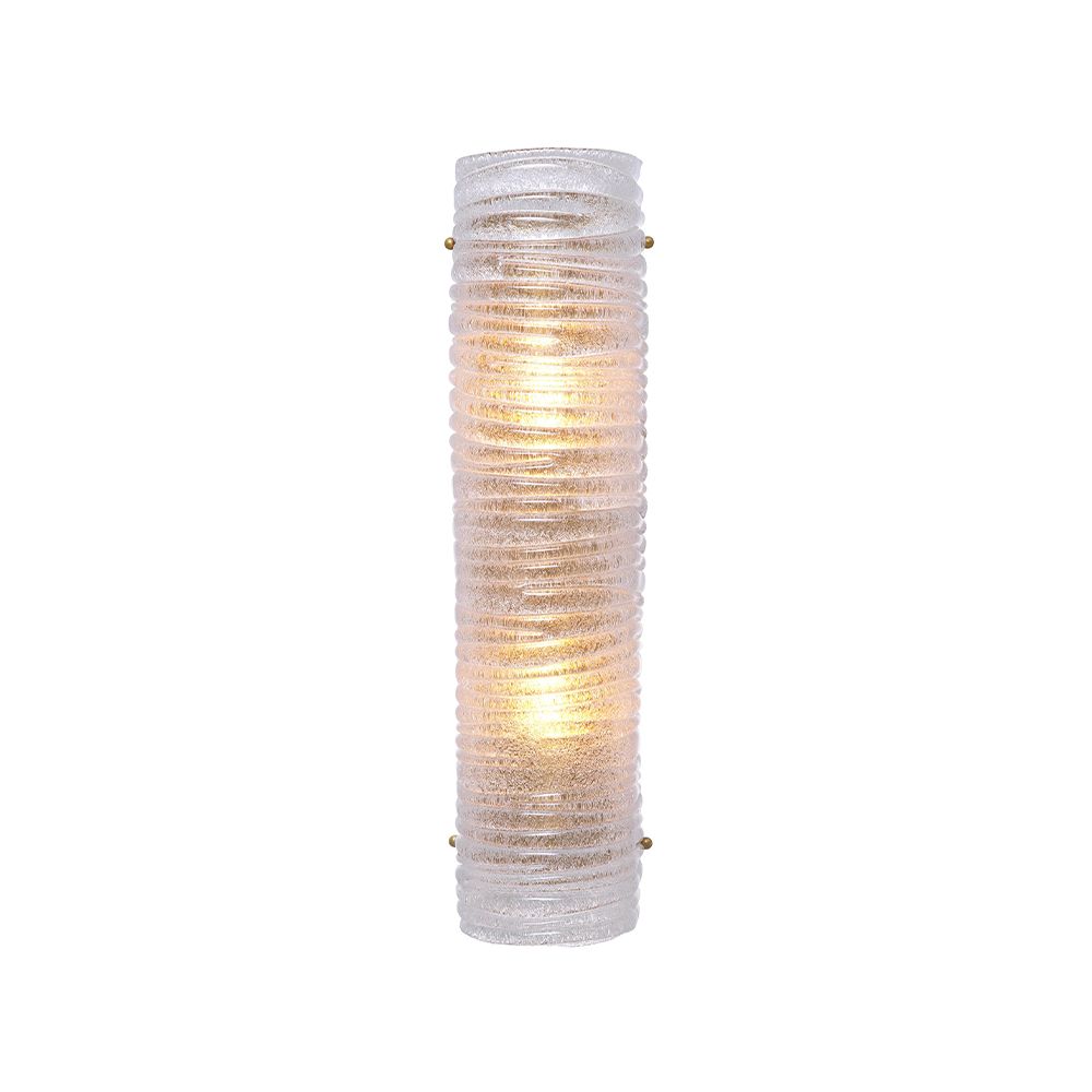 A gorgeous wall lamp by Eichholtz with a modern design and vintage brass finish with a ribbed clear glass shade