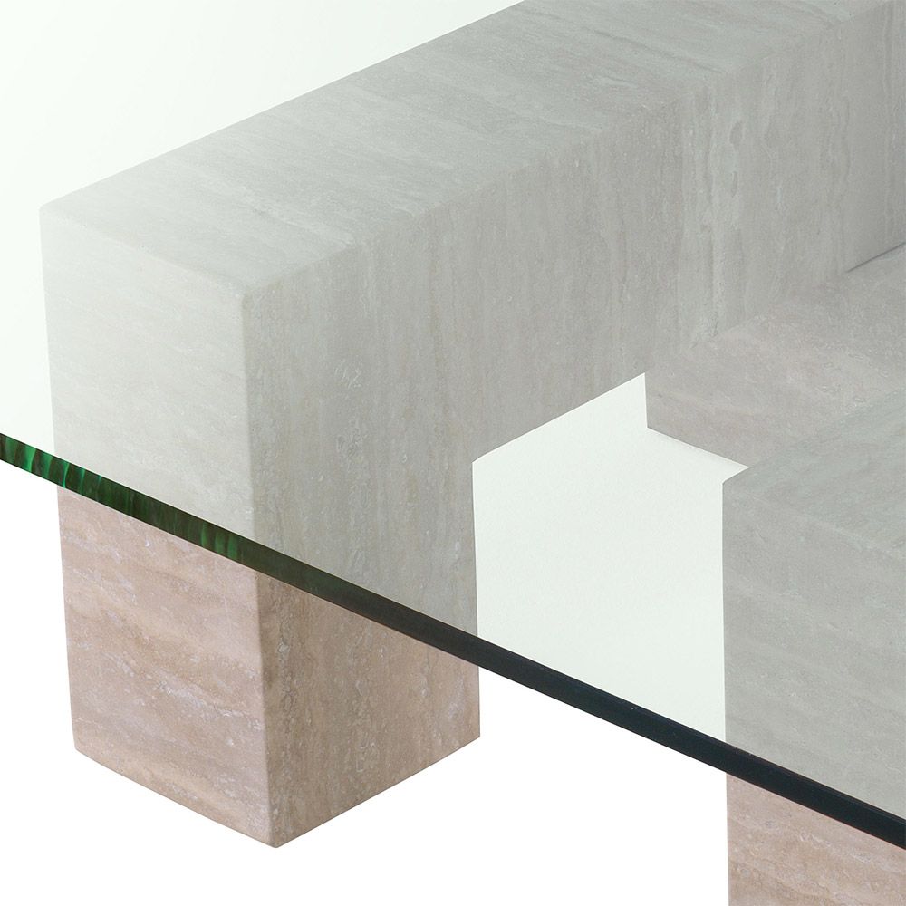 Graceful and sophisticated modern coffee table with glass surface and travertine base