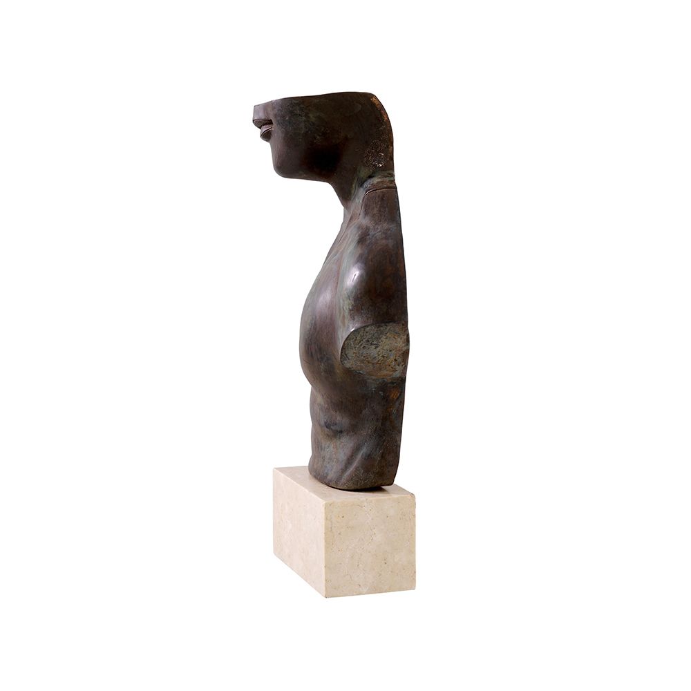 A statement torso sculpture by Eichholtz with an antique bronze finish and marble base