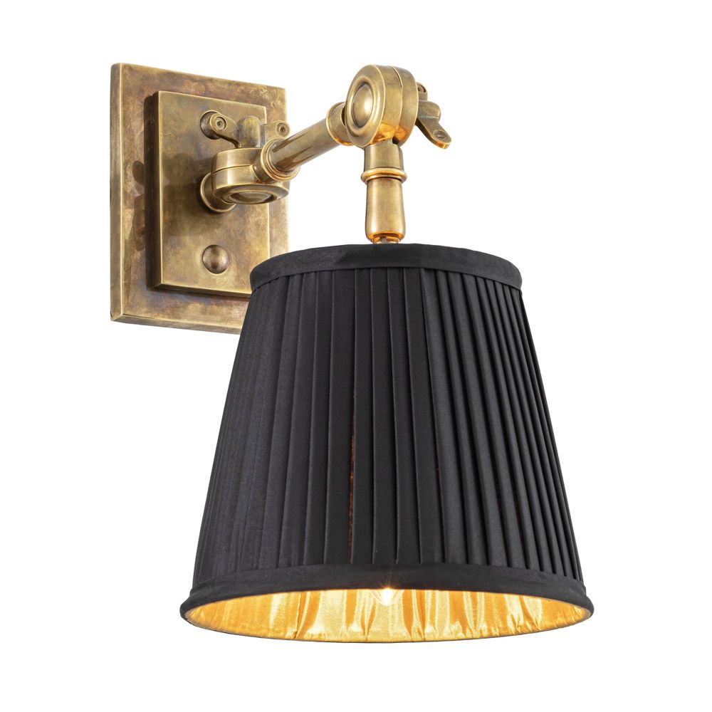 Opulent black and gold wall light with vintage effect