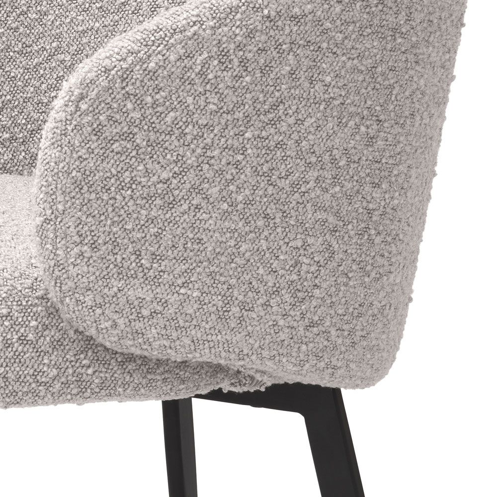 Cosy grey boucle dining chairs with curved back/arm rest