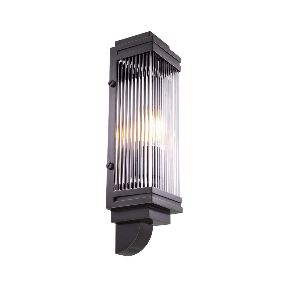 A art deco inspired wall lamp in a bronze finish.