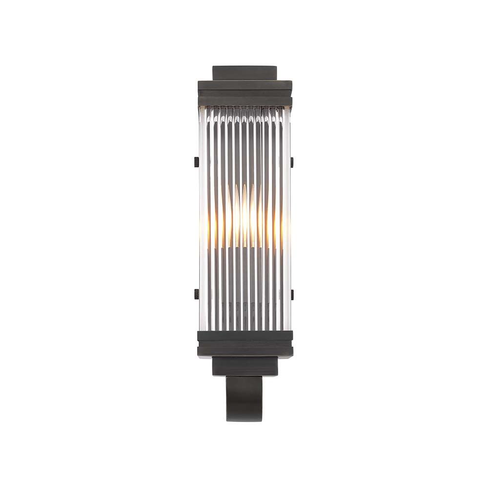 A art deco inspired wall lamp in a bronze finish.